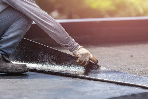 Professional Waterproofing technician working in Eau Claire, MI